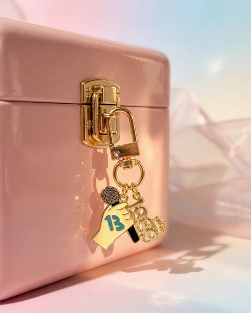 1989 keychain charms laid flat