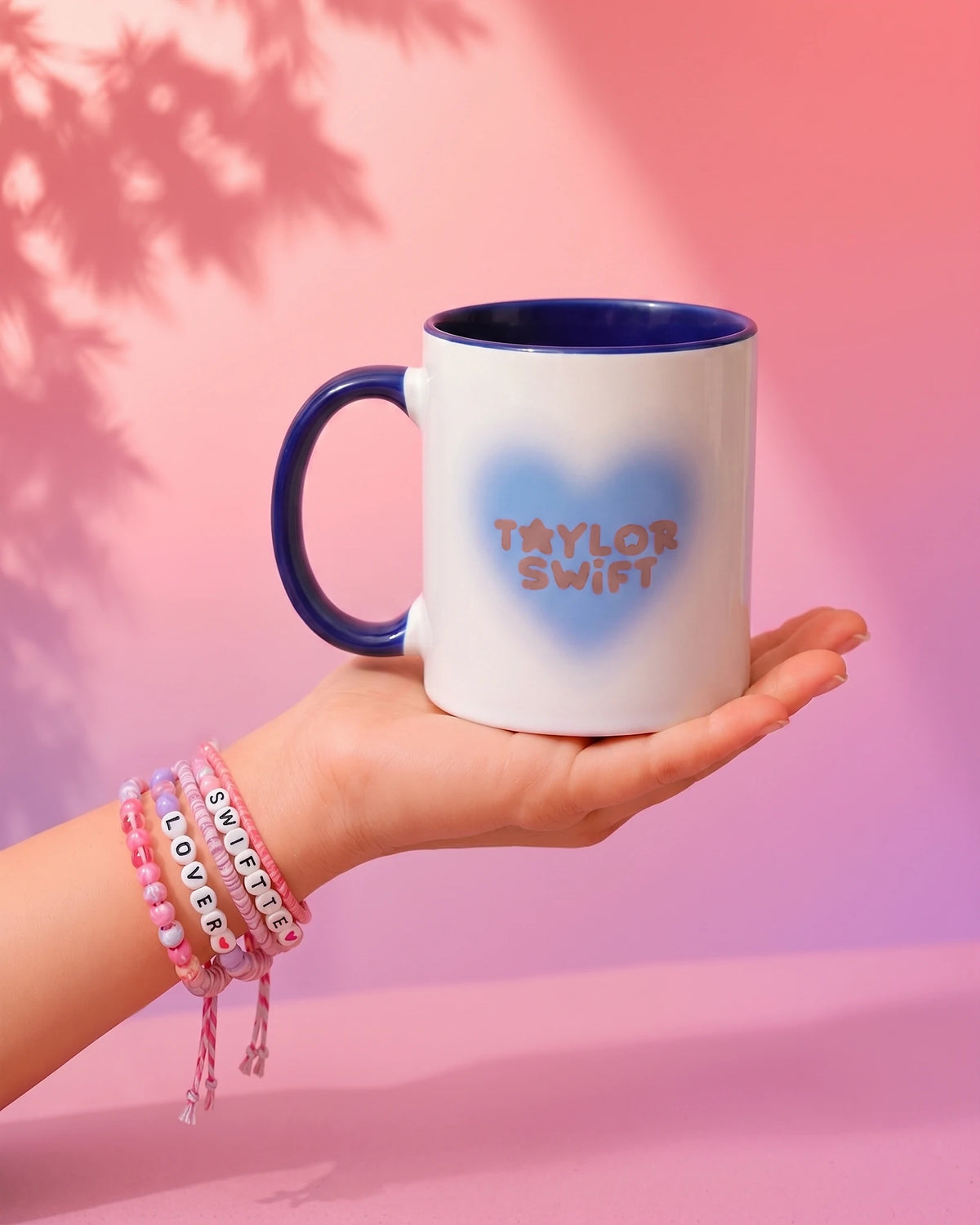 Midnights ceramic mug with a blurred heart and deep navy handle