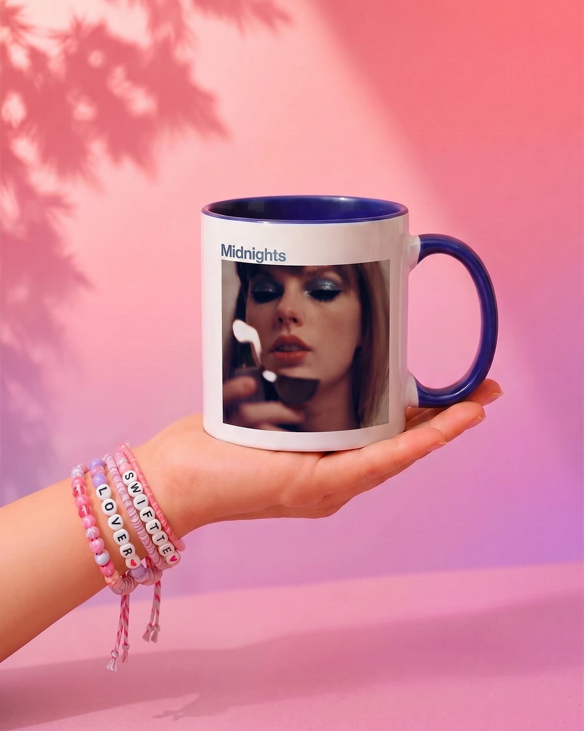 Midnights mug showing the album cover side and navy inner glaze