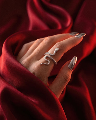 Reputation coiled snake ring in silver tone, adjustable band