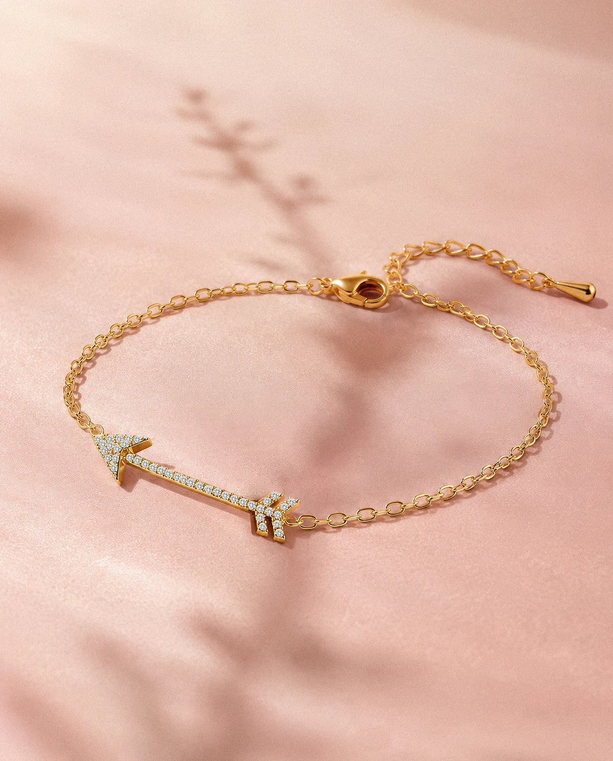 The Archer pave arrow bracelet in gold tone