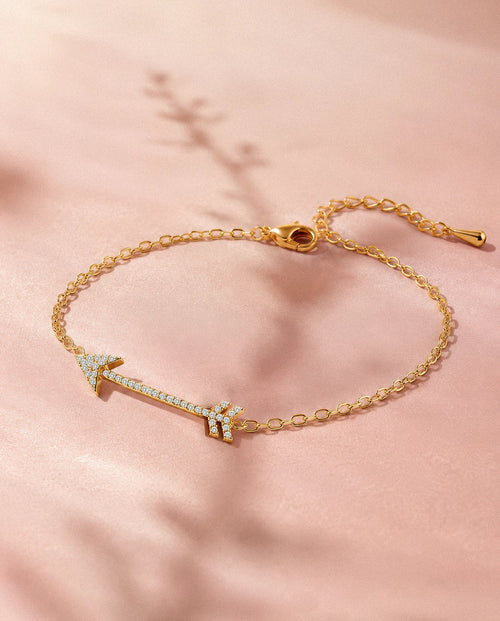 The Archer pave arrow bracelet in gold tone