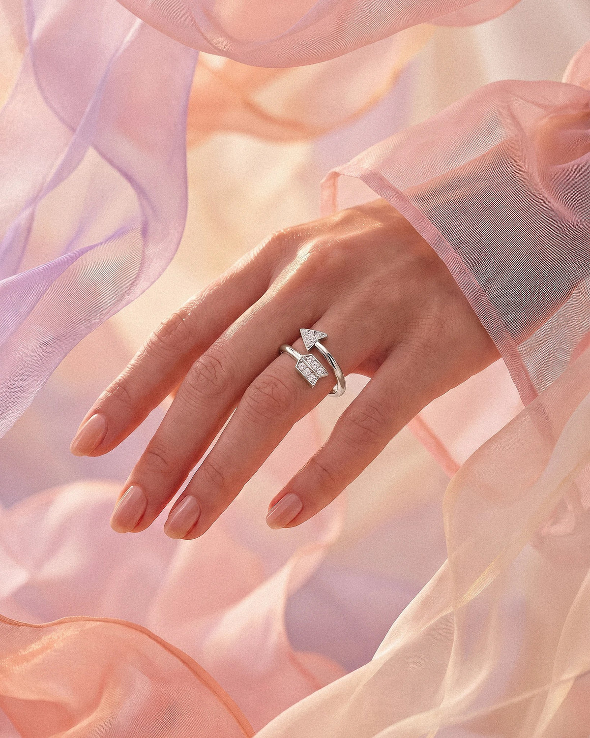 The Archer arrow ring in silver tone